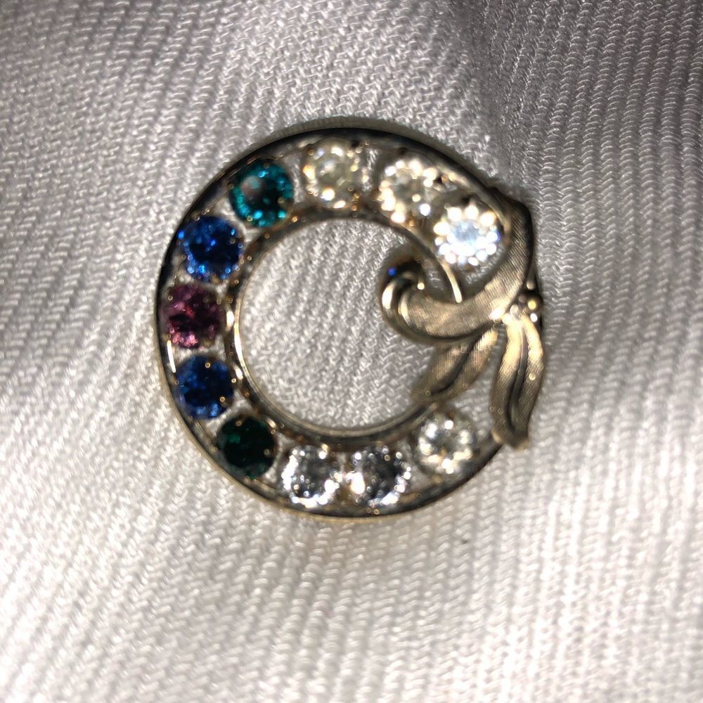 Vintage multi colored stone brooch, no brand markings
